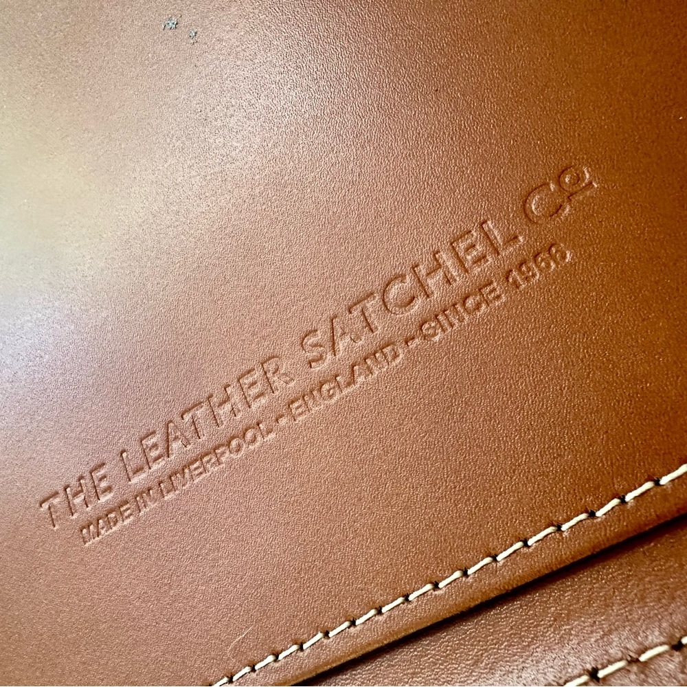 NWOT the leather satchel co leather crossbody book bag with dust bag and strap. - Picture 7 of 8